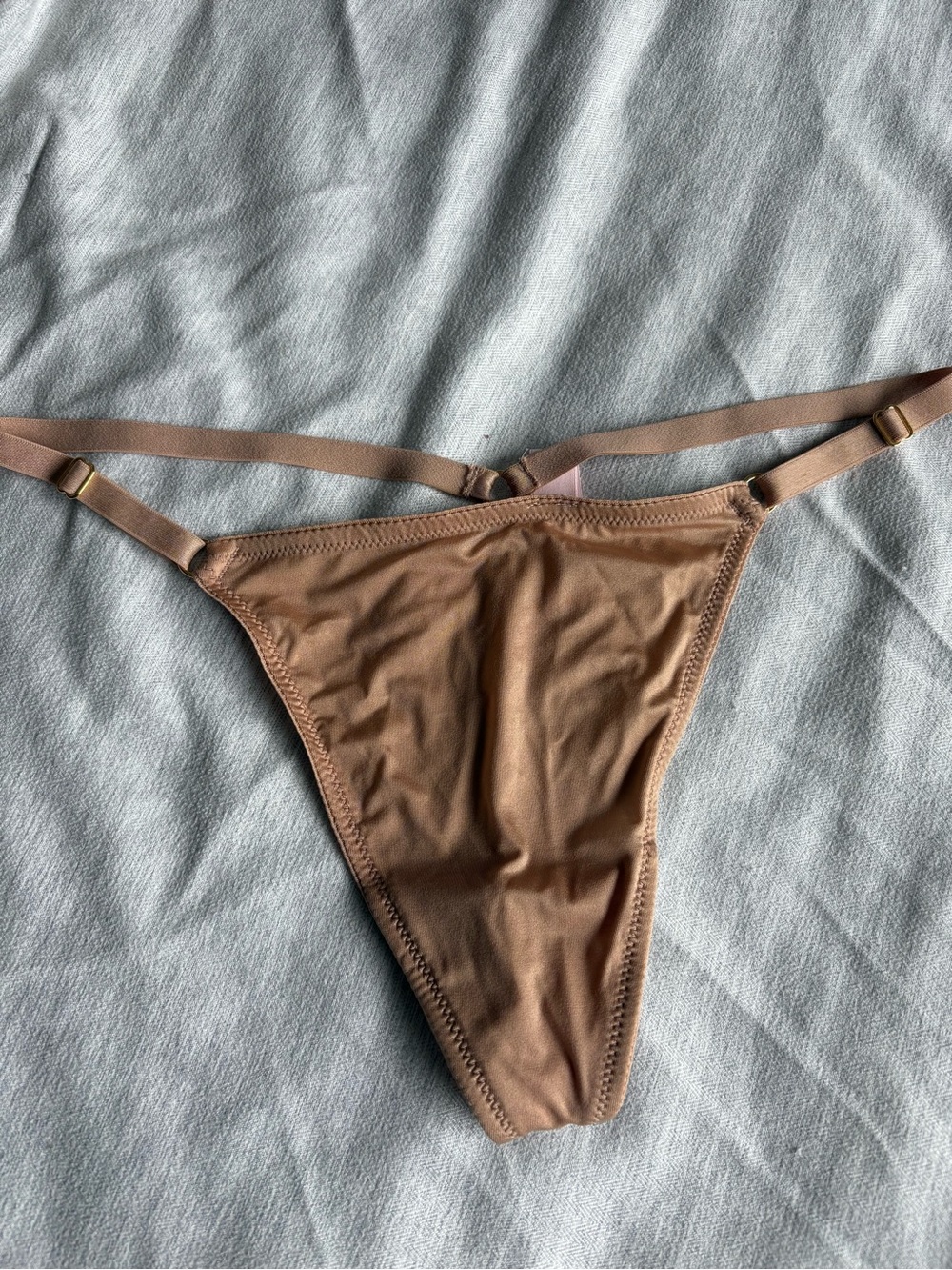 Golden brown G string